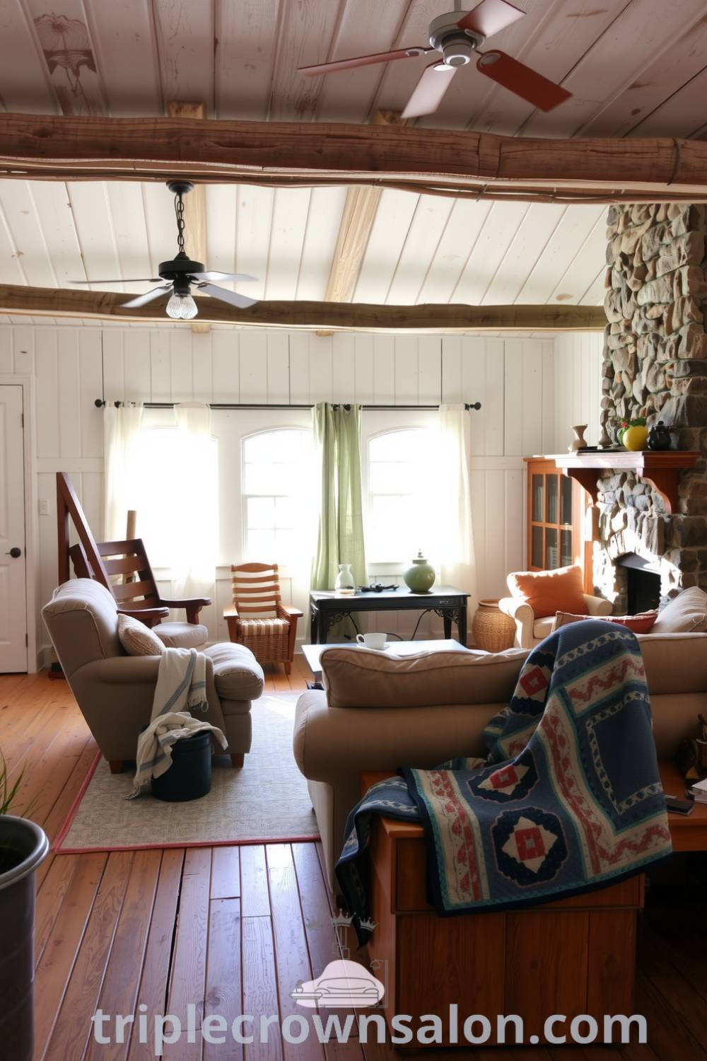 A cozy rustic living room featuring whitewashed wooden walls, an overstuffed sofa with handmade quilts, a stone fireplace, and sunlight streaming through linen-draped windows, showcasing unique decor ideas for your home, inspiring and inviting atmosphere, featured on fireplacesandwoodstoves.com.