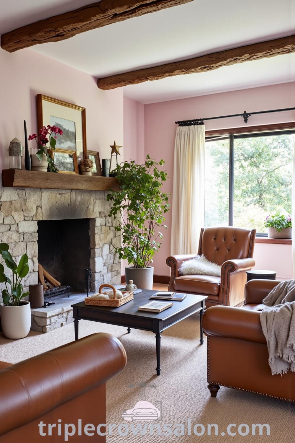 Rustic living room with soft pink walls, large stone fireplace, worn leather furniture, and natural light streaming through sheer curtains, showcasing cozy ideas and decor inspirations for a warm and inviting home, featured on fireplacesandwoodstoves.com.