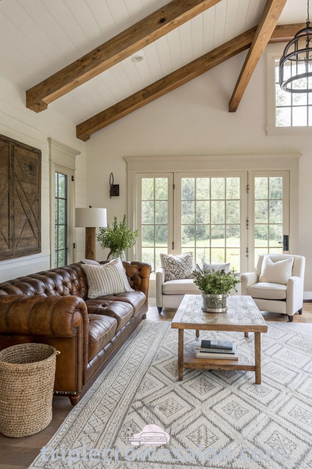 A cozy modern farmhouse living room filled with inviting furniture, large windows, and rustic decor, offering decor ideas for small spaces and modern grandma style. Discover design tips and inspirations for creating a stylish and comfortable home at triplecrownsalon.com.