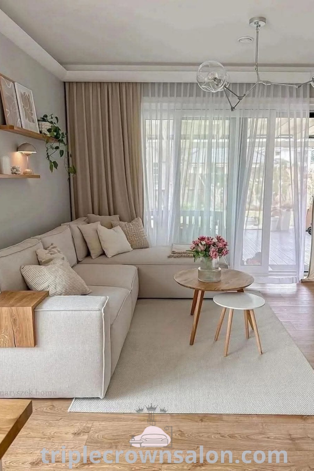 A modern apartment living room featuring inviting furniture, a white rug atop hardwood floors, and cozy decor inspirations, creating an aesthetic space perfect for apartment decor ideas. Discover more unique living room decor tips at triplecrownsalon.com.