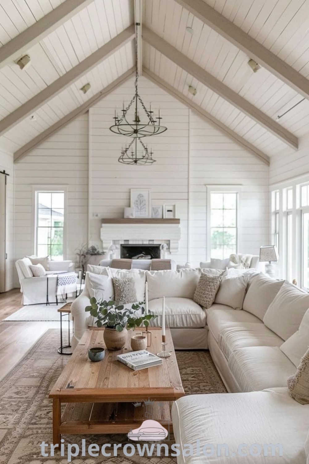 A cozy farmhouse living room filled with stylish furniture and a fireplace, showcasing "Country Boho Home" decor. This inviting space contains design ideas and decor inspirations ideal for any house or apartment, making it perfect for cozy living. Explore more unique ideas at triplecrownsalon.com.
