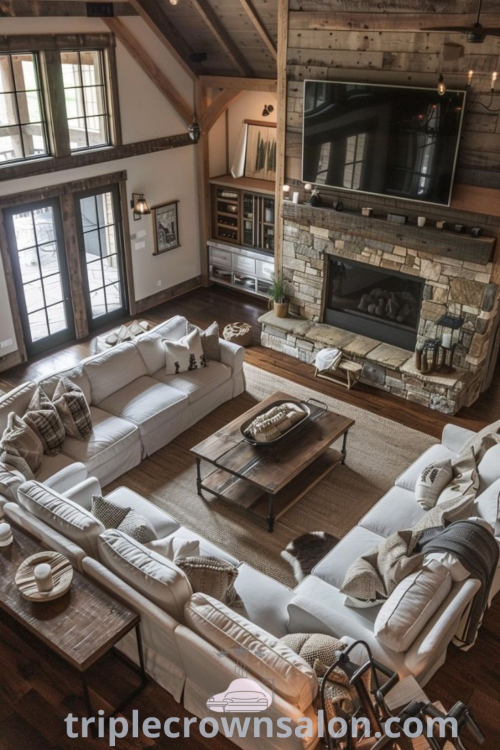 A charming rustic farmhouse living room showcasing modern farmhouse designs, industrial aesthetics, and cozy decor ideas. This inviting space features natural materials and earthy tones, perfect for inspiring your home decor. For more ideas, visit triplecrownsalon.com.