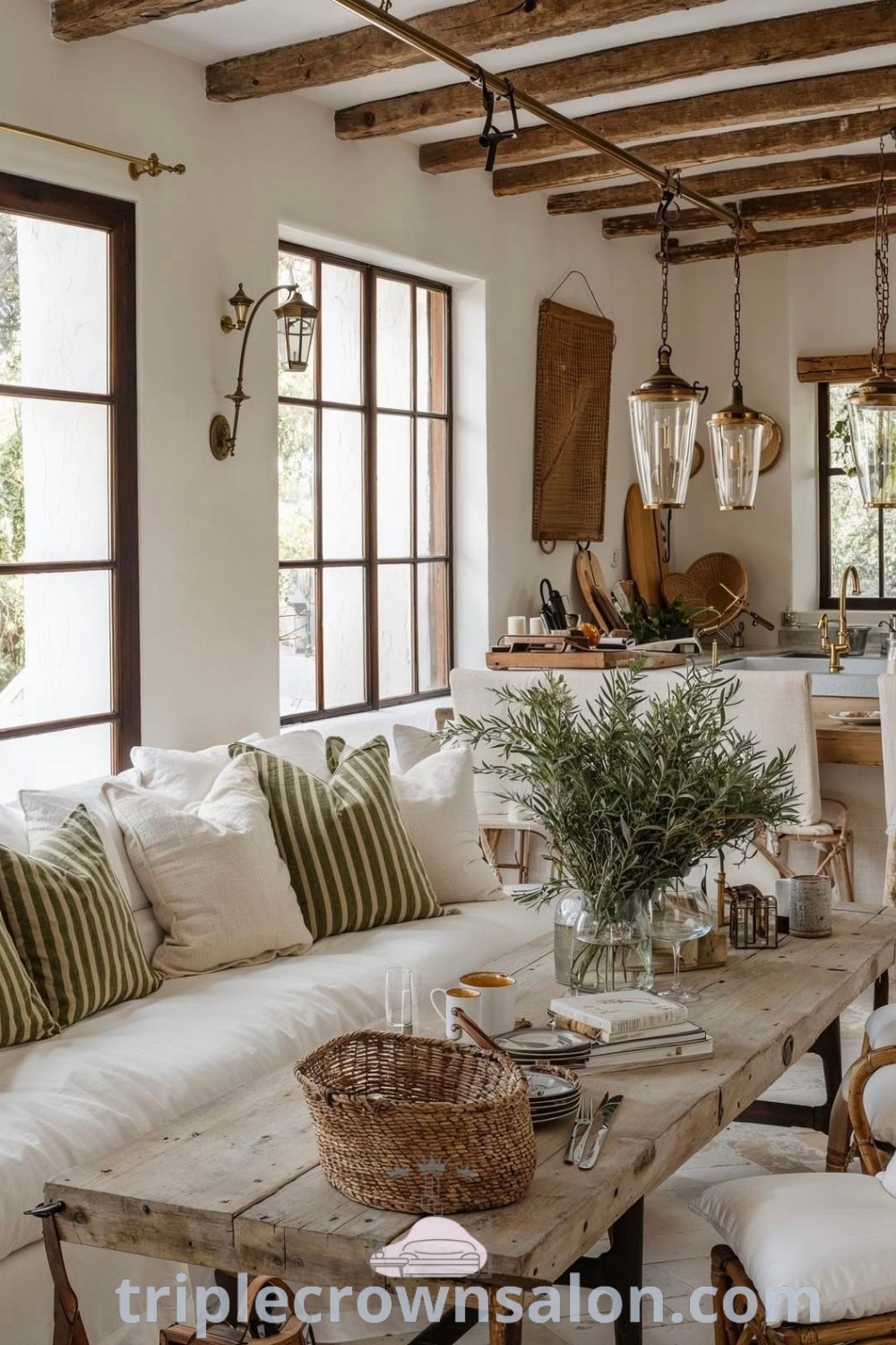 A cozy living room inspired by Belgian farmhouse and French modern home interiors, featuring ample windows and stylish furniture. This inviting space showcases unique ideas and decor inspirations for a comfortable home, providing design tips for any house or apartment. Explore more on triplecrownsalon.com.