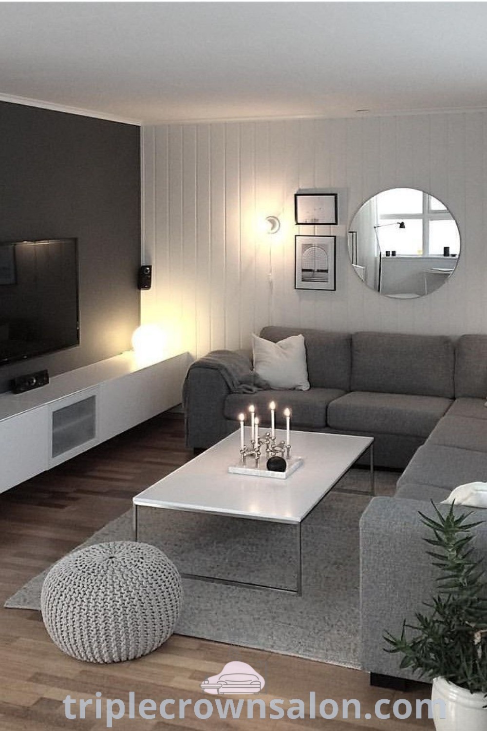 A Scandinavian design living room filled with luxe furniture, featuring a flat screen TV on a wooden floor, offering cozy decor ideas and inspiring inspirations perfect for apartment living. Visit triplecrownsalon.com for more home design tips and decor ideas.