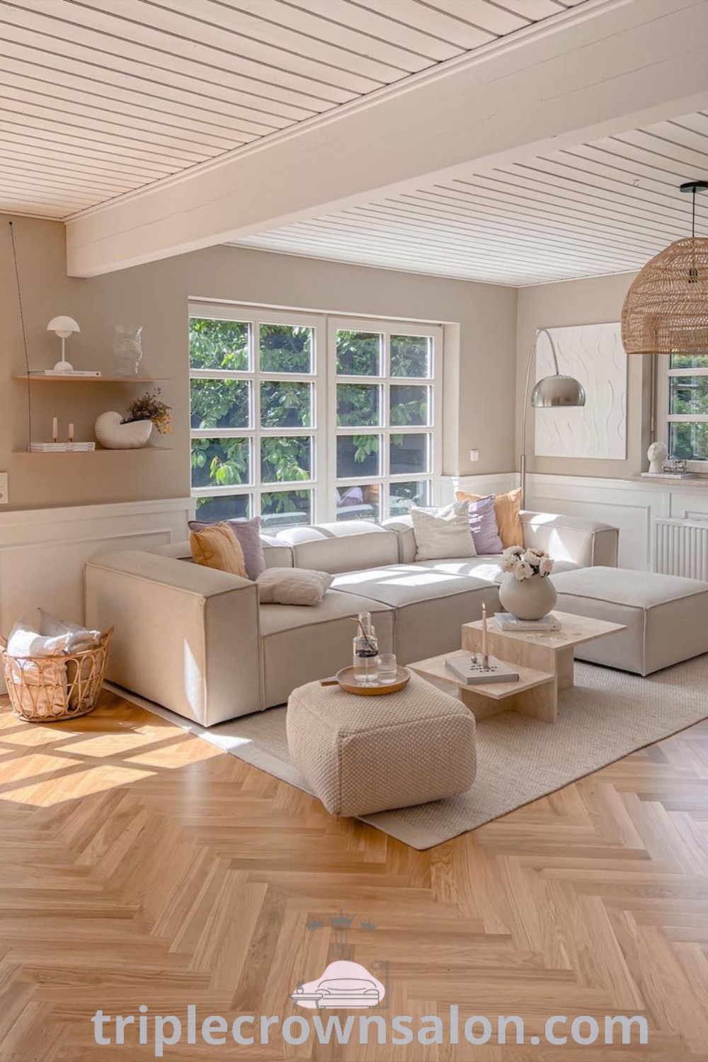 A cozy Scandinavian living room filled with stylish furniture and wooden floors, reflecting a warm and inviting atmosphere. This decor idea offers unique inspirations for a cozy home, perfect for enhancing your living space. Find more design ideas and inspirations at triplecrownsalon.com.