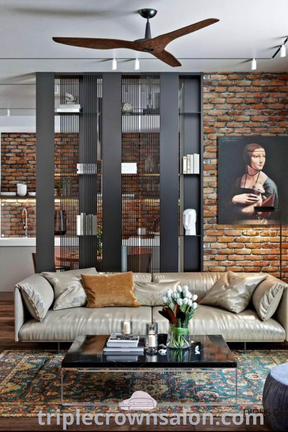 An industrial living room showcasing a stylish brick wall and modern furniture, illustrating the perfect blend of function and aesthetic appeal. This cozy space provides unique ideas and inspirations for your home. Discover more decor inspirations at triplecrownsalon.com.