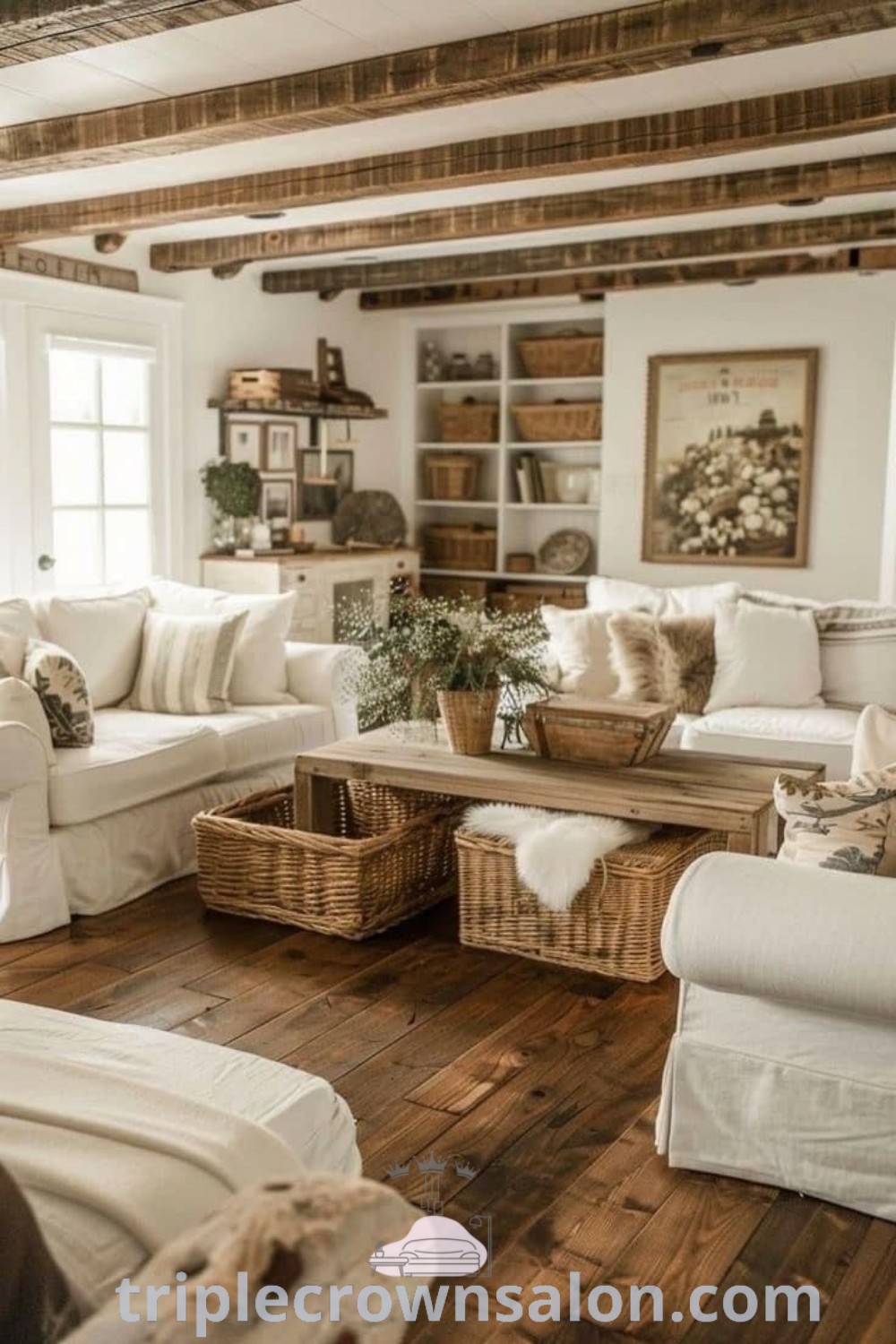 A cozy farmhouse living room featuring white furniture and an abundance of pillows, embodying modern farmhouse antique decor. This inviting space is perfect for cozy ideas, showcasing stylish farmhouse accessories and inspirations for your home. For more design tips and ideas, visit triplecrownsalon.com.