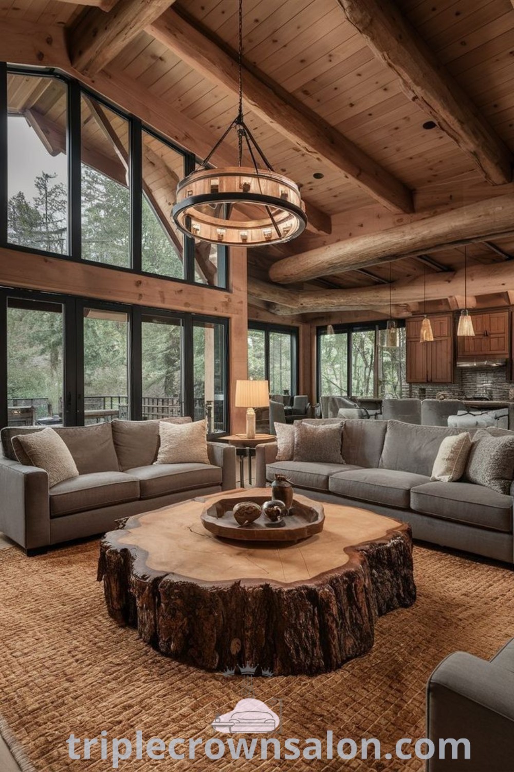 A cozy log cabin living room filled with rustic furniture, wooden planked walls, and a large window, highlighting inspiring log home living room ideas, decor inspirations, and unique designs. Discover more cozy decor ideas at triplecrownsalon.com.
