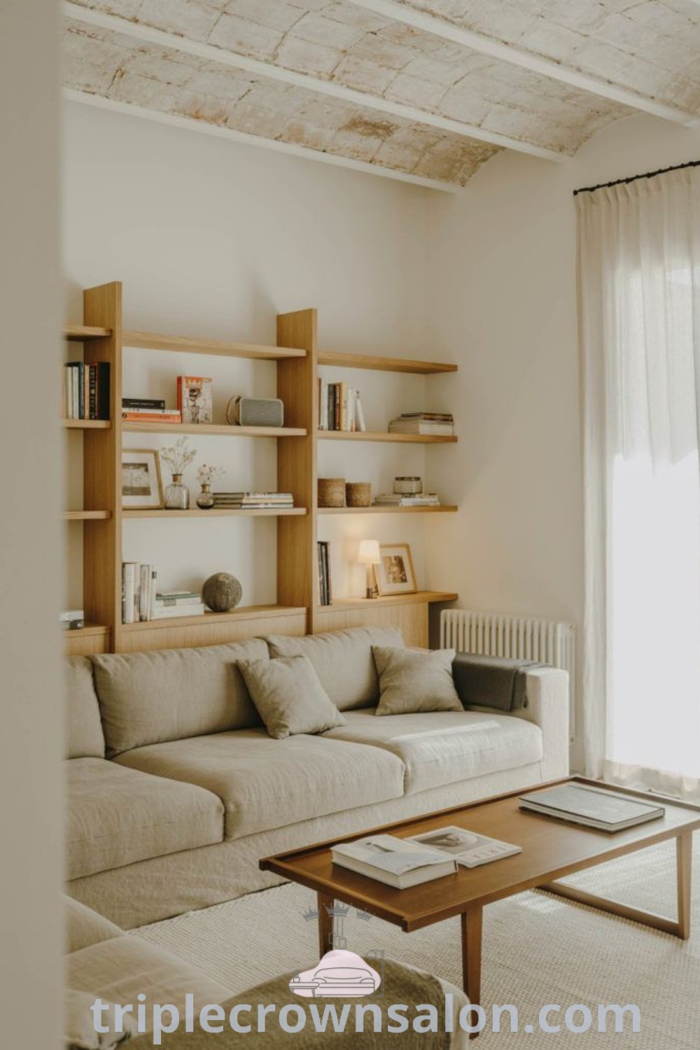 A cozy Japandi living room featuring clean lines and functional decor ideas, creating an inviting atmosphere. The design showcases minimalism and warmth, perfect for inspiring decor ideas for small spaces. Discover more design inspirations at triplecrownsalon.com.